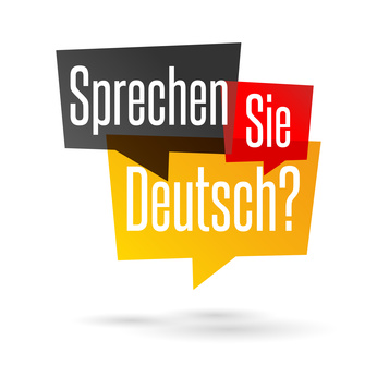 Bild: Eckige Sprechblasen mit dem Schriftzug Sprechen (Schwarz) - Sie (rot) - Deutsch (Gelb)